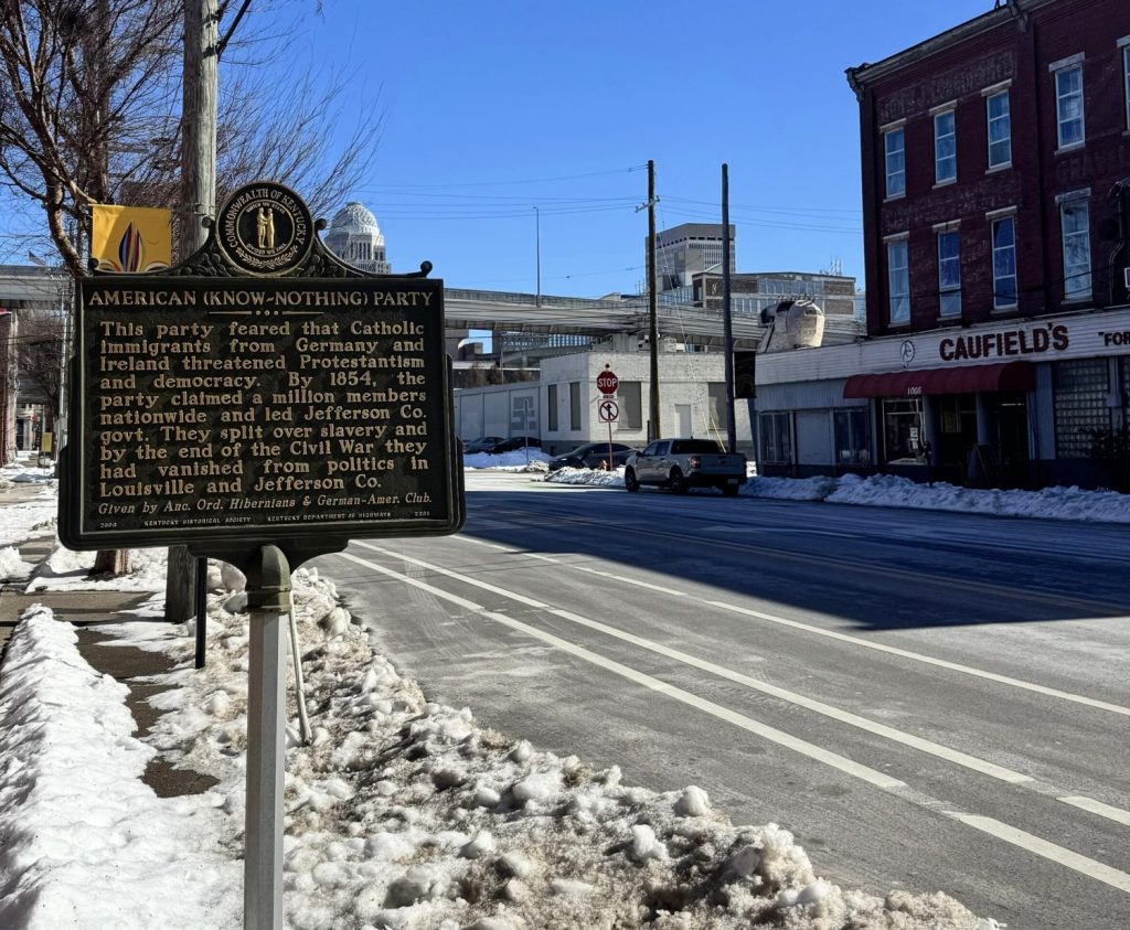 Historic marker describing Bloody Monday riot in 1855. Main Street Louisville.